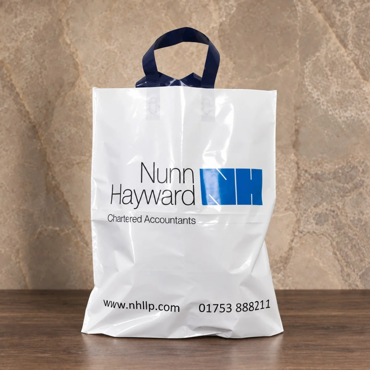 White Nunn Hayward Printed Flexiloop Plastic Carrier Bag With Blue Loop Handles