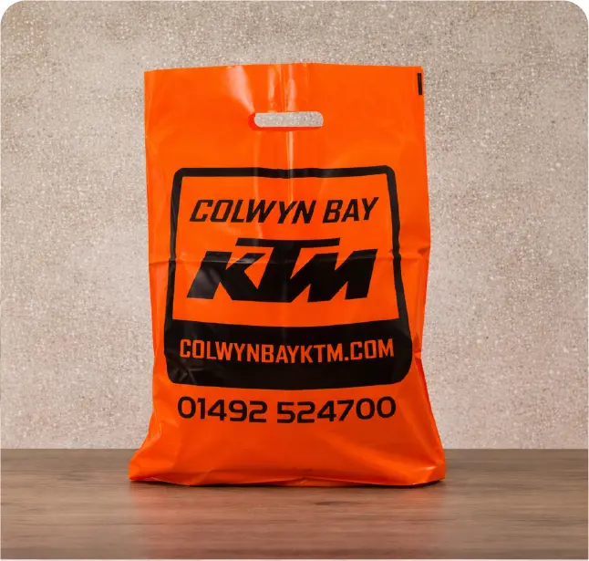 Punched-out handle plastic bags